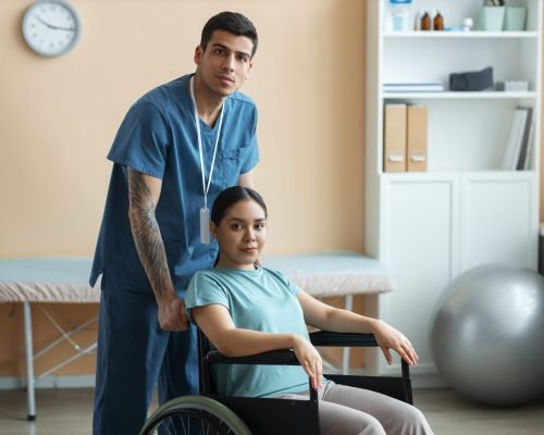 doctor-helping-patient-rehabilitation