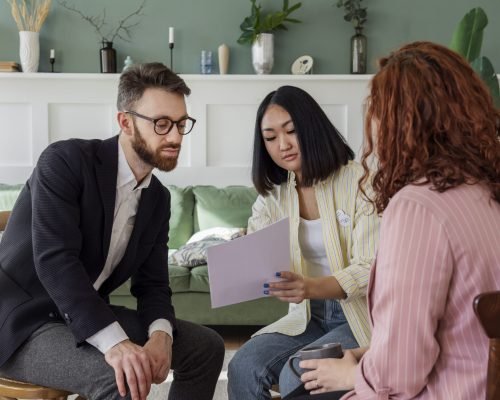 people-having-debate-while-looking-computer
